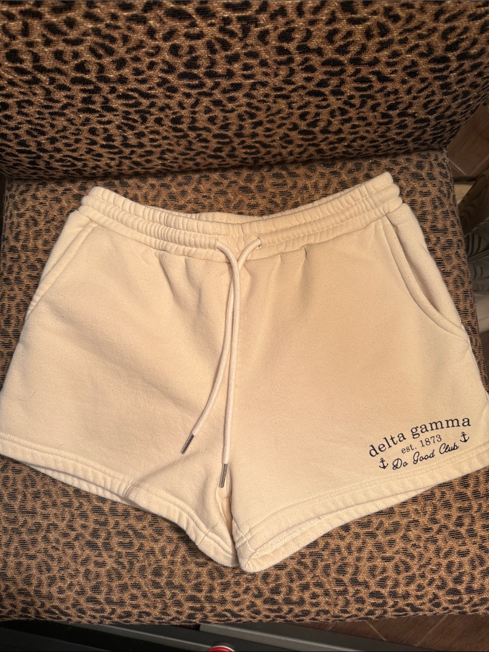 TCL Cream Delta Gamma Logo Athletic Shorts